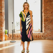 Robe d’été midi femme – Légère, fluide et élégante à motif feuillage