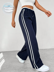 Trend | Pantalon Large Femme Streetwear – Confort, Style & Détails Sportifs