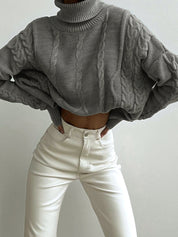 Pull femme Nima – col roulé oversize en maille douce & design intemporel